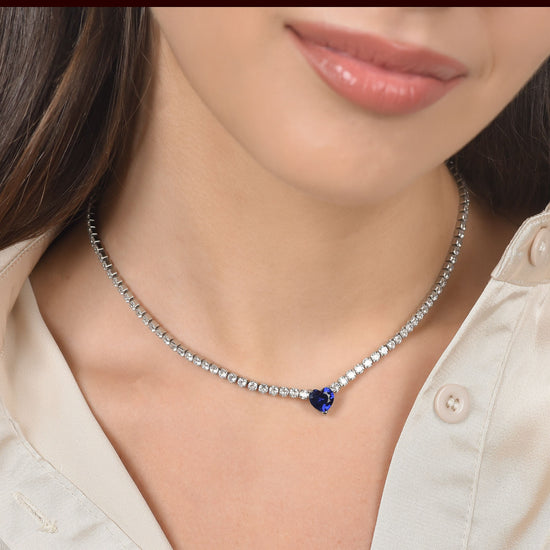 COLLAR DE TENIS DE ACERO PARA MUJER CON CRISTALES BLANCOS Y CORAZÓN DE CRISTAL AZUL