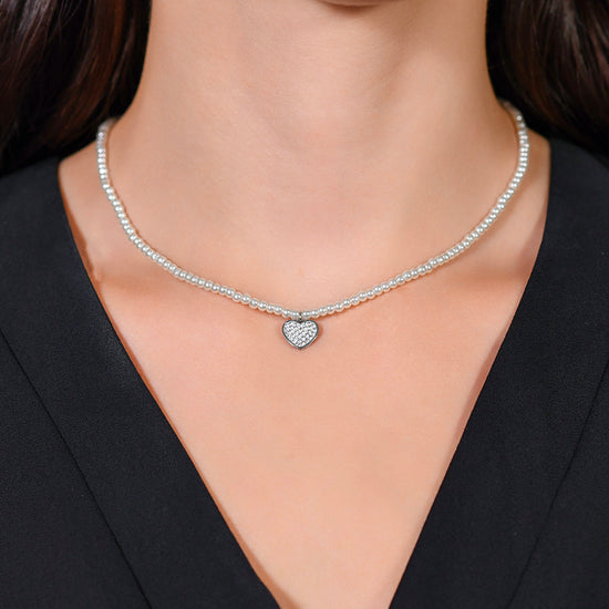 COLLAR DE PERLAS Y CORAZONES DE ACERO