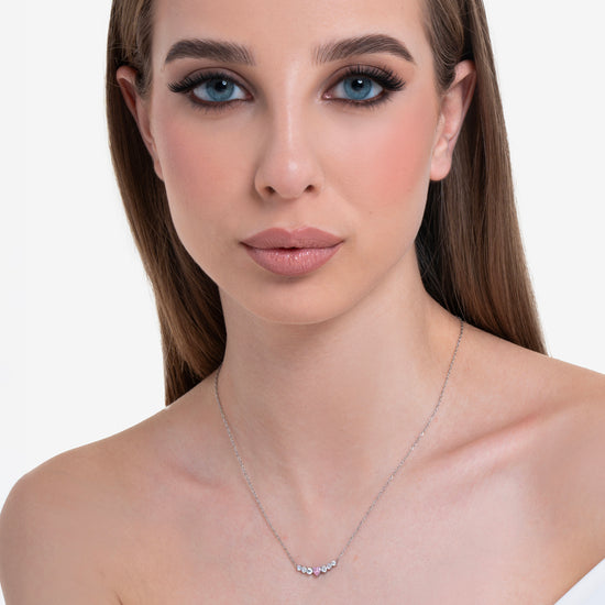 Carica immagine nella Galleria COLLANA DONNA IN ACCIAIO CON CUORE ROSA E CRISTALLI BIANCHI
