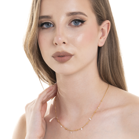 Carica immagine nella Galleria COLLANA DONNA IN ACCIAIO IP GOLD CON ZIRCONI BIANCHI
