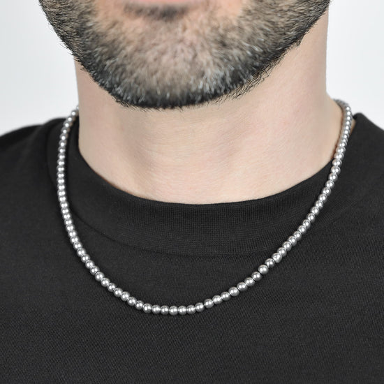 COLLAR DE HOMBRE DE ACERO CON PERLAS GRISES