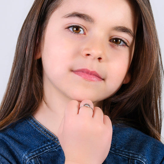 ANILLO DE NIÑA DE ACERO CON CORONA DE CRISTAL BLANCO
