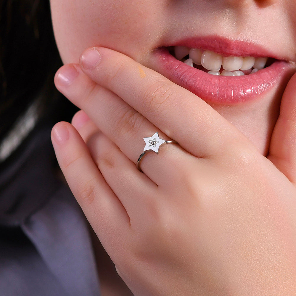 ANILLO DE NIÑA DE ACERO CON ESTRELLA