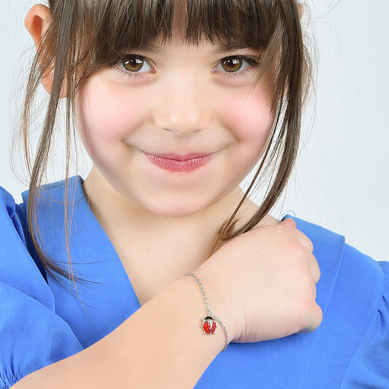 PULSERA DE ACERO NIÑA CON MARIQUITA