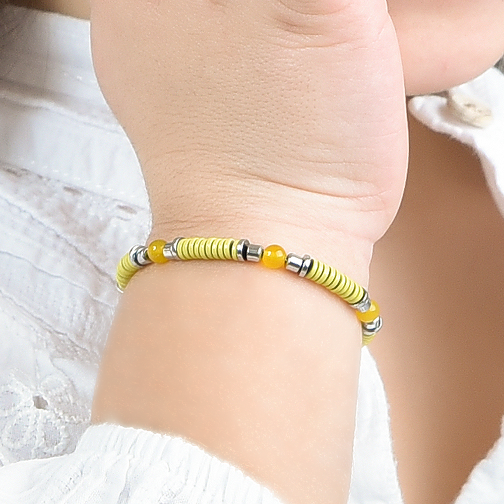 PULSERA DE ACERO PARA NIÑA CON PIEDRAS AMARILLAS Y ELEMENTOS DE ESMALTE AMARILLO