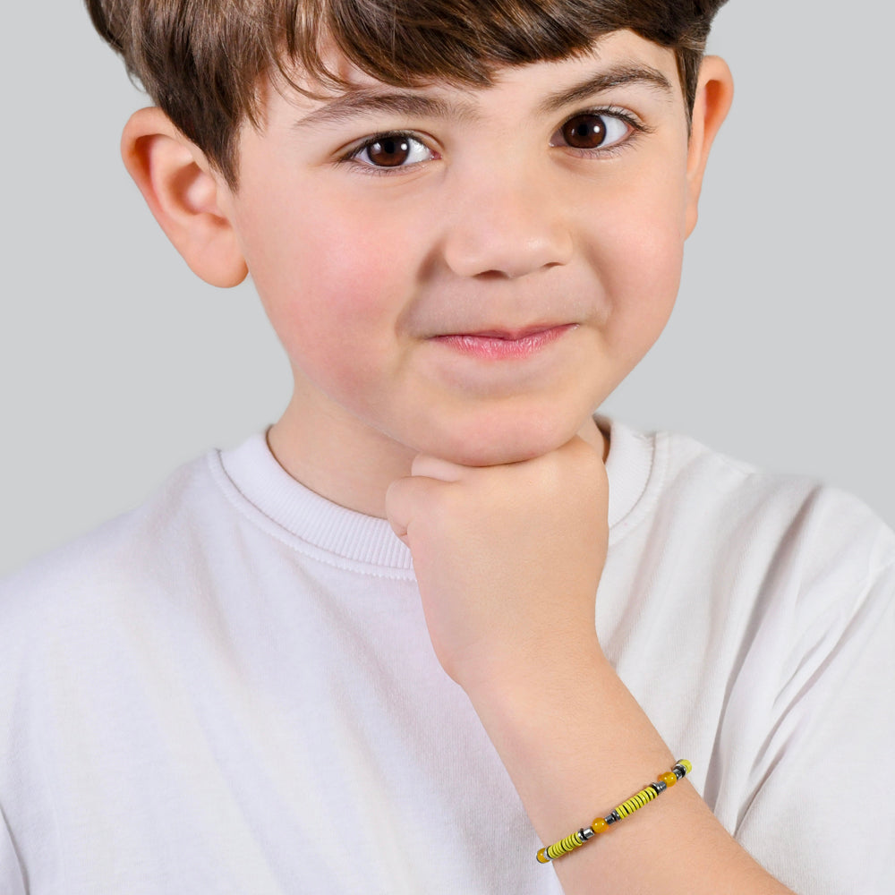 PULSERA DE ACERO PARA NIÑA CON PIEDRAS AMARILLAS Y ELEMENTOS DE ESMALTE AMARILLO