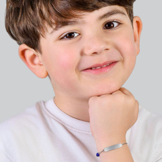 PULSERA DE ACERO PARA BEBÉ CON PIEDRAS AZULES Y NEGRAS