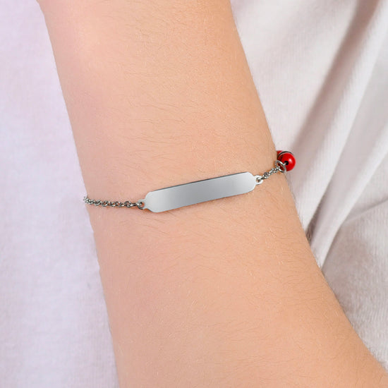 PULSERA DE ACERO PARA BEBÉ CON PIEDRAS ROJAS Y NEGRAS