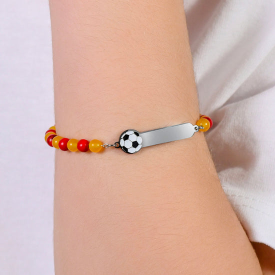 PULSERA DE ACERO PARA BEBÉ CON PIEDRAS ROJAS Y AMARILLAS