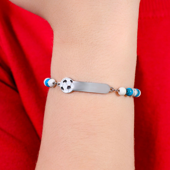 PULSERA DE ACERO PARA BEBÉ CON PIEDRAS AZULES Y BLANCAS