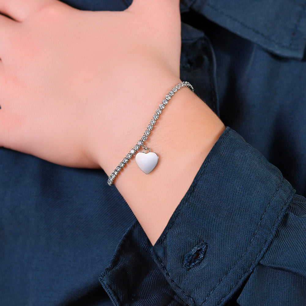 PULSERA DE TENIS DE ACERO PARA NIÑA CON CRISTALES BLANCOS Y CORAZÓN