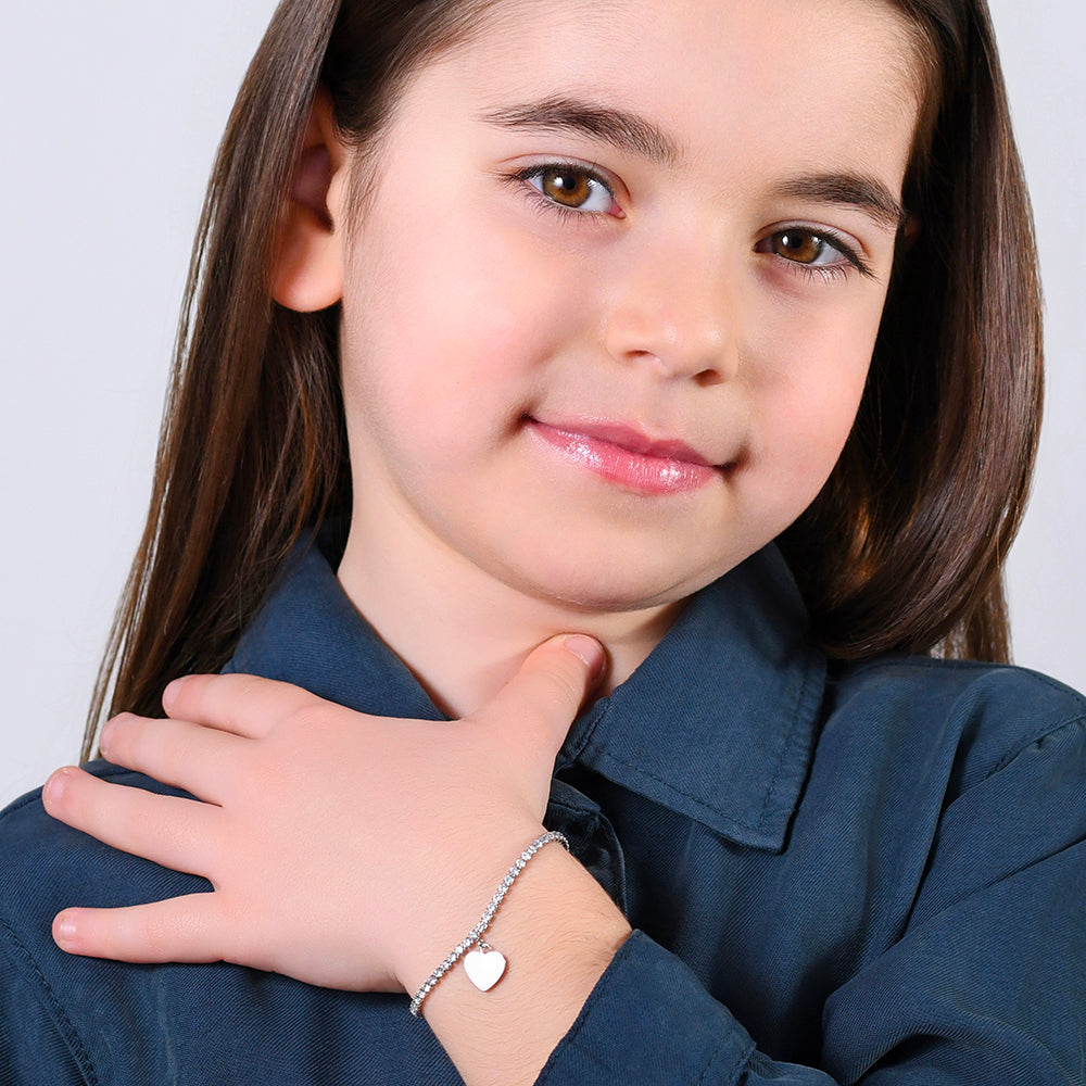 PULSERA DE TENIS DE ACERO PARA NIÑA CON CRISTALES BLANCOS Y CORAZÓN