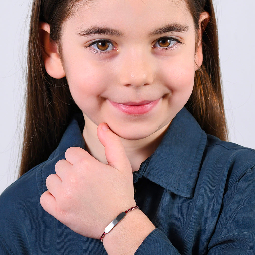 PULSERA DE TENIS DE NIÑA DE ACERO CON CRISTALES ROJOS Y PLACA