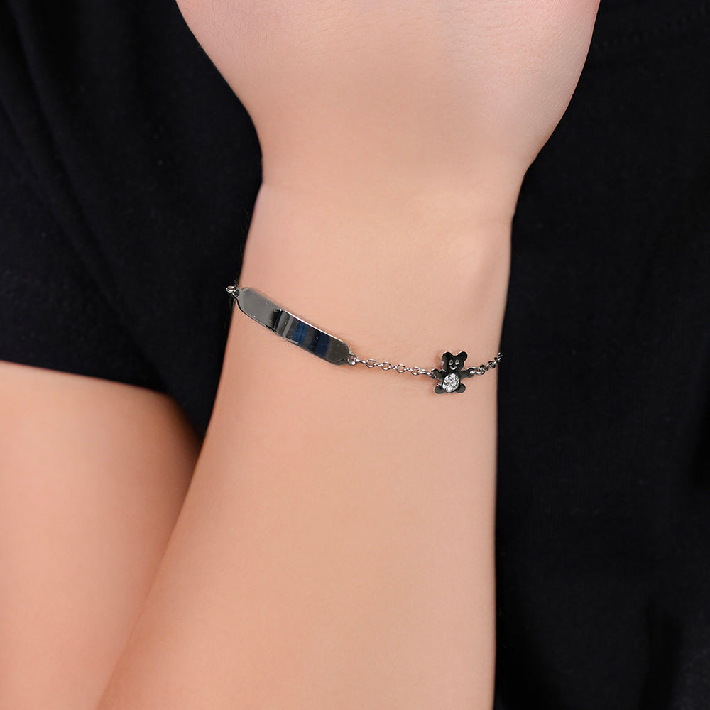 PULSERA DE ACERO NIÑA CON PLACA Y OSITO CON CRISTALES BLANCOS