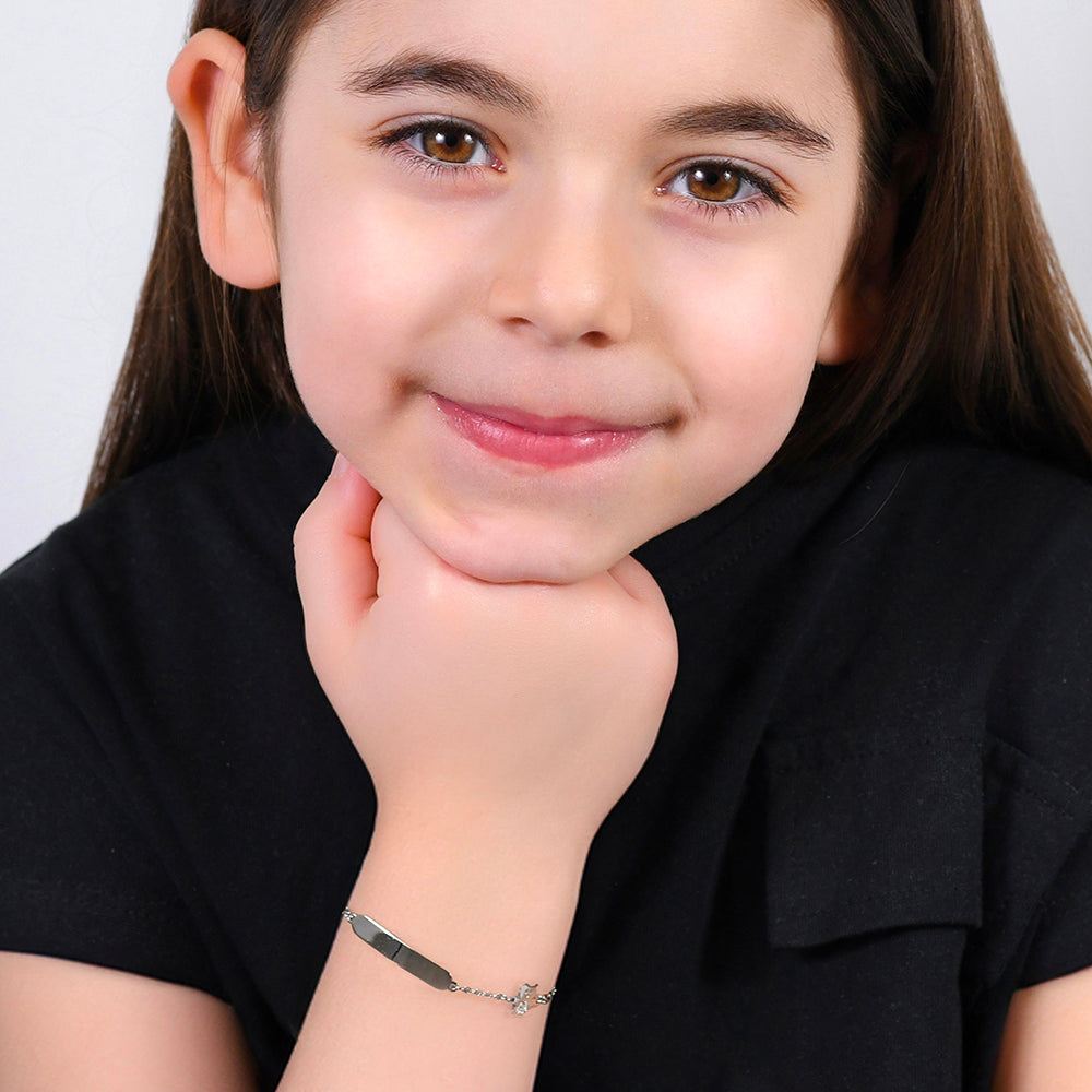PULSERA DE ACERO NIÑA CON PLACA Y OSITO CON CRISTALES BLANCOS