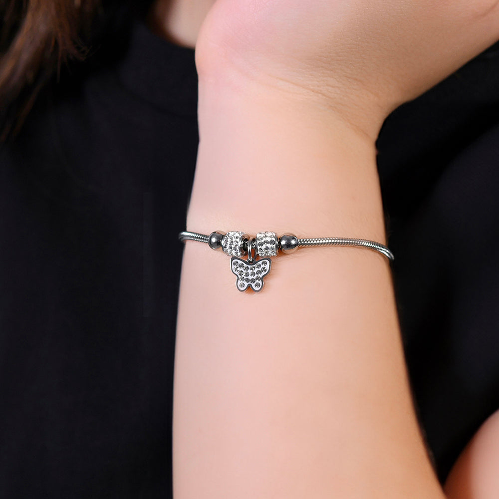 PULSERA MARIPOSA DE ACERO CON CRISTALES BLANCOS