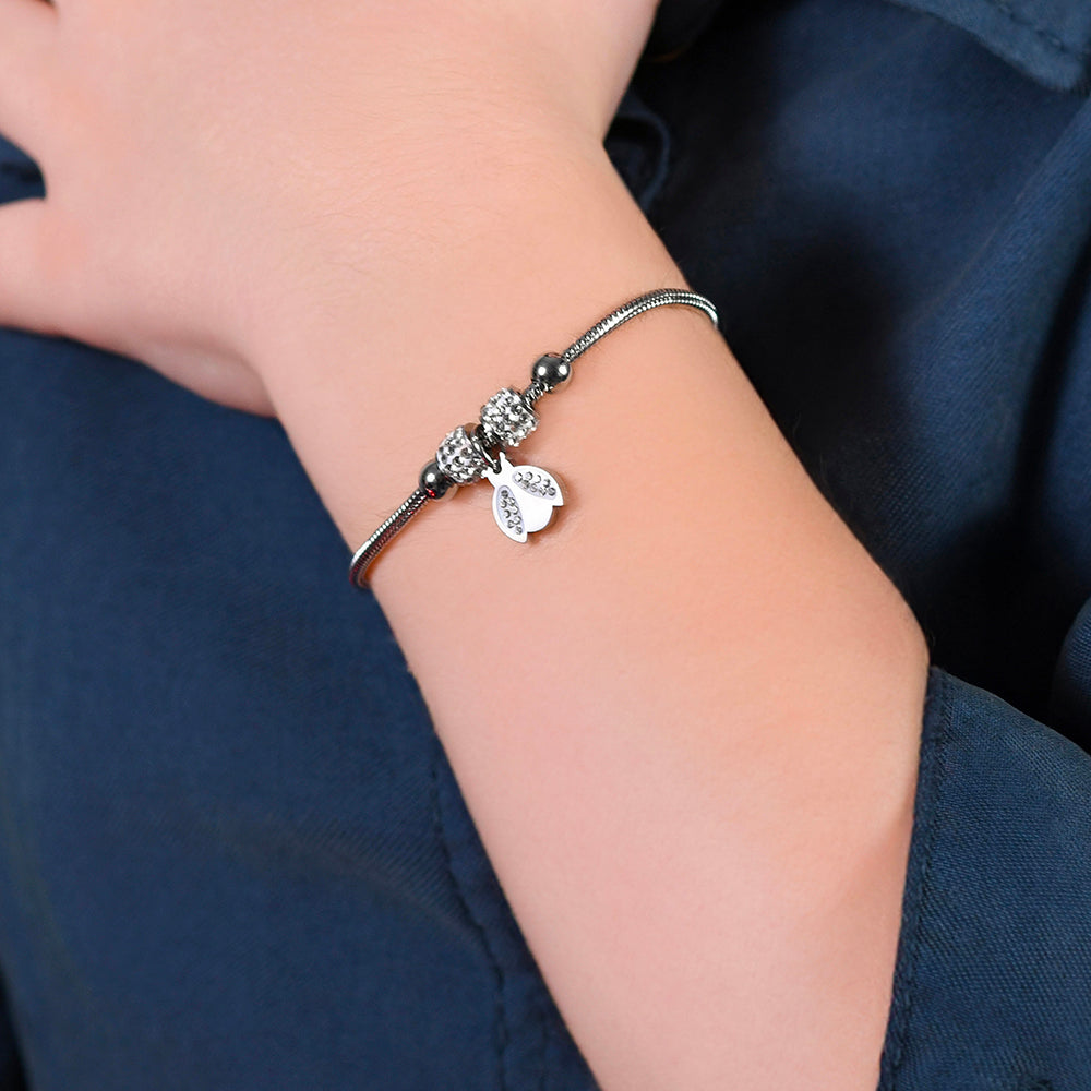 PULSERA DE ACERO NIÑA CON MARIQUITA CON CRISTALES BLANCOS