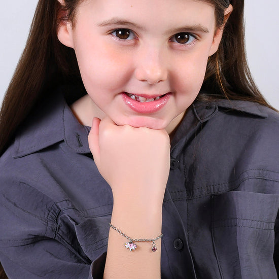 PULSERA UNICORNIO DE ACERO CON ESMALTE ROSA Y BLANCO Y CRISTAL