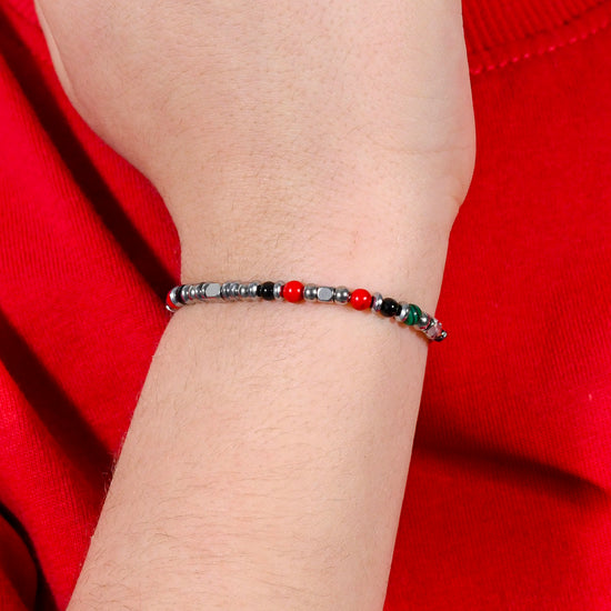 PULSERA DE ACERO PARA BEBÉ CON PIEDRAS MULTICOLORES