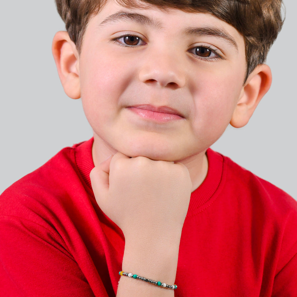 PULSERA DE ACERO PARA BEBÉ CON PIEDRAS MULTICOLORES