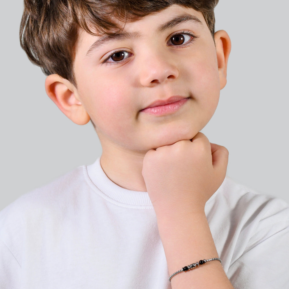 PULSERA BEBE ACERO PIEDRAS NEGRAS