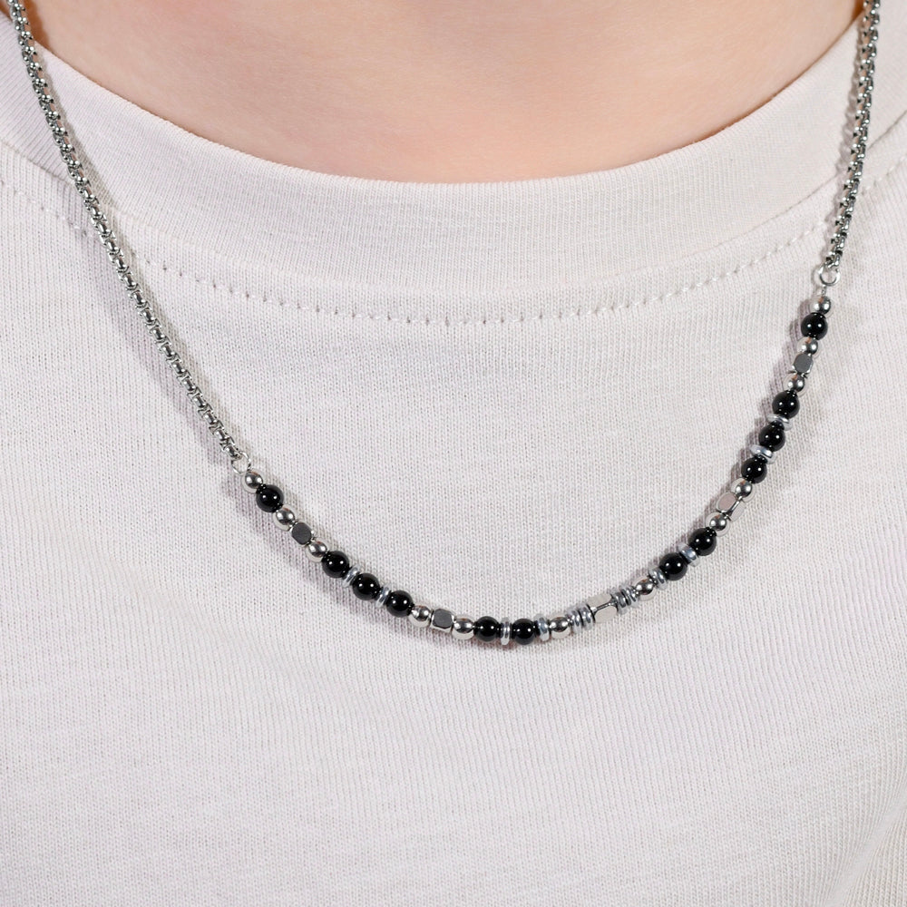COLLAR DE ACERO PARA BEBÉ CON PIEDRAS NEGRAS Y GRISES