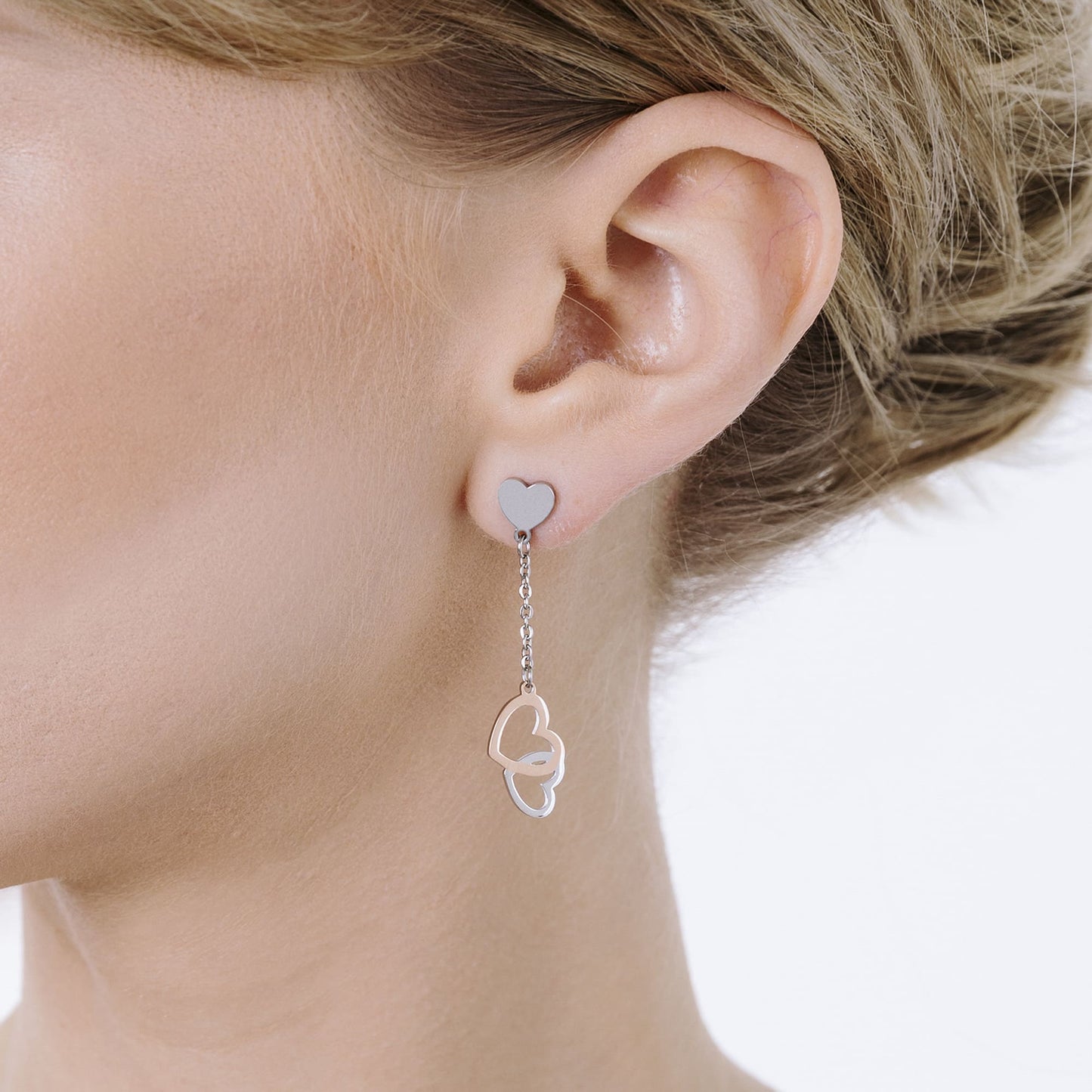 PENDIENTES DE ACERO CON CORAZONES DE ACERO Y ROSAS DE ACERO IP