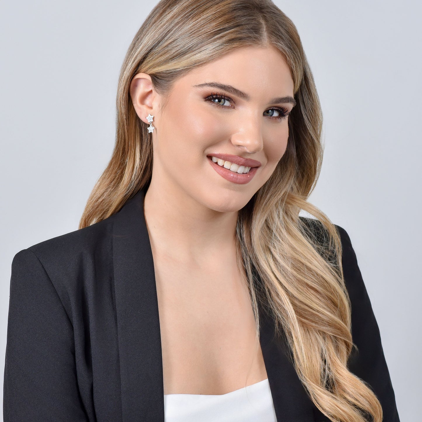 PENDIENTES DE MUJER ESTRELLA DE ACERO CON CRISTALES BLANCOS