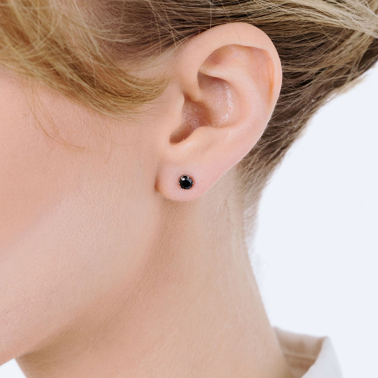 PENDIENTES DE FOCOS DE ACERO CON CRISTAL NEGRO