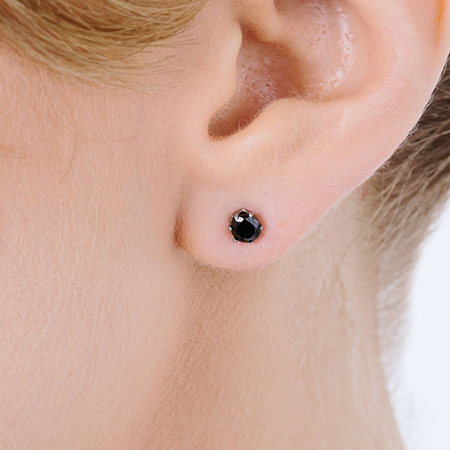 PENDIENTES DE FOCOS DE ACERO CON CRISTAL NEGRO