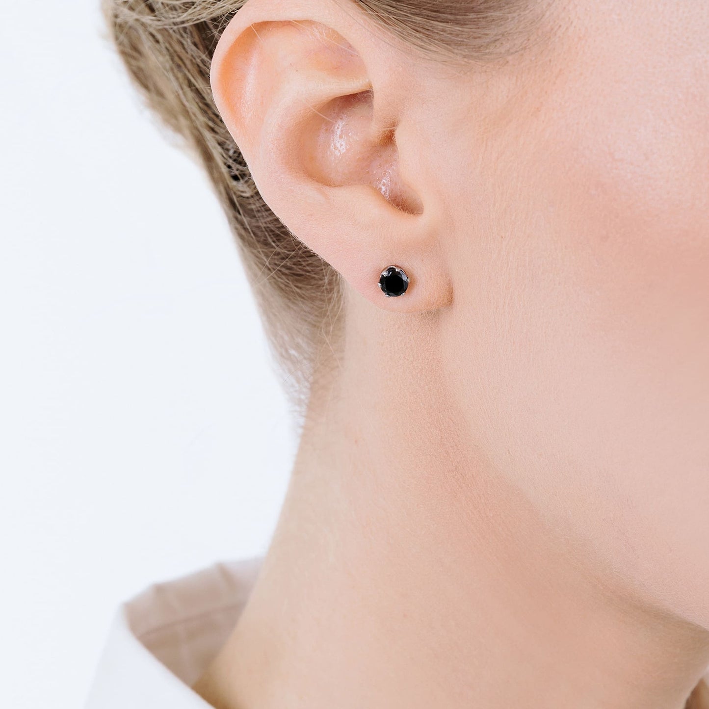 PENDIENTES DE FOCOS DE ACERO CON CRISTAL NEGRO