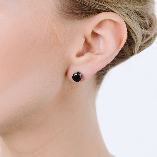 PENDIENTES DE FOCOS DE ACERO CON CRISTAL NEGRO