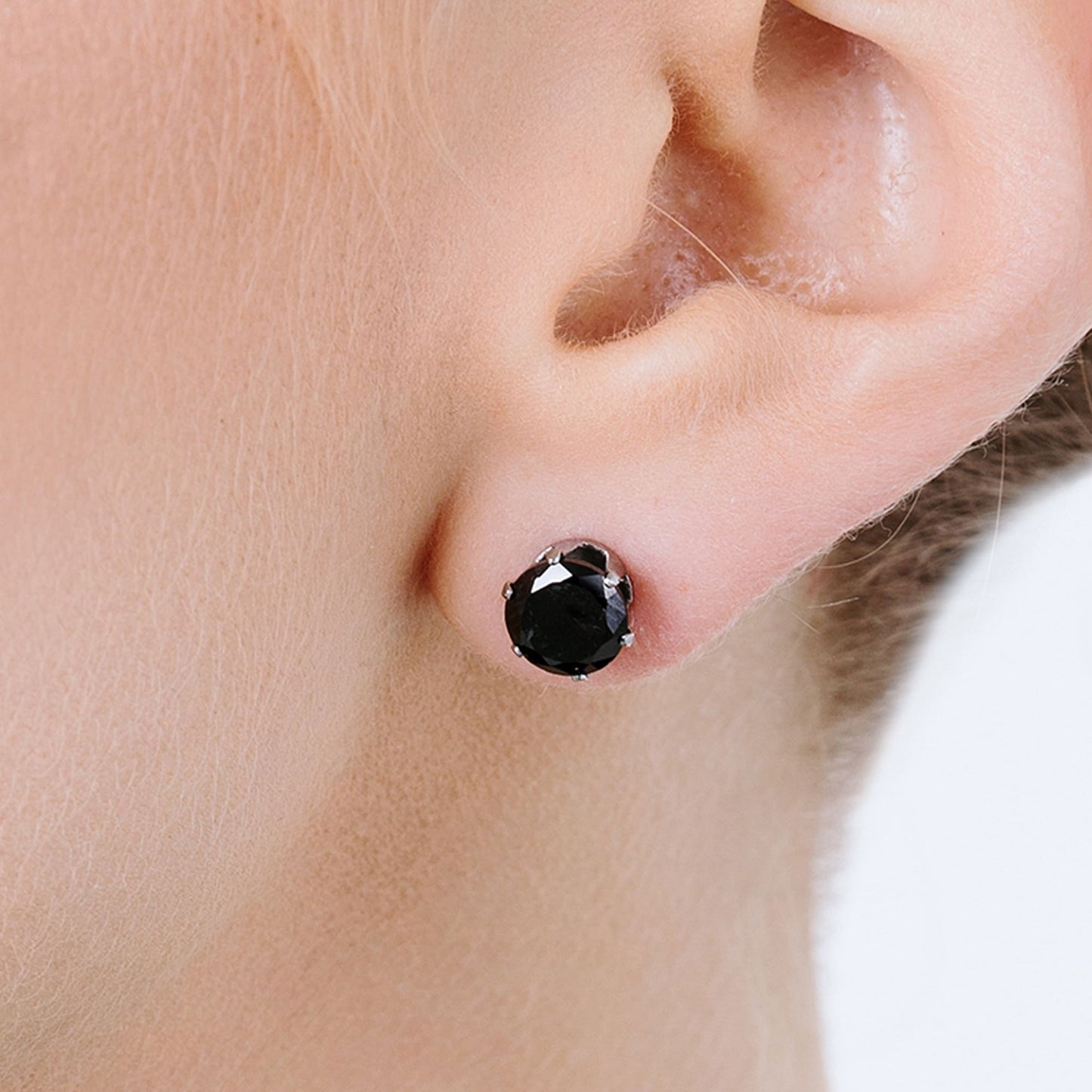 PENDIENTES DE FOCOS DE ACERO CON CRISTAL NEGRO