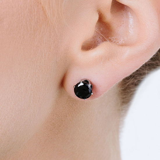 PENDIENTES DE FOCOS DE ACERO CON CRISTAL NEGRO
