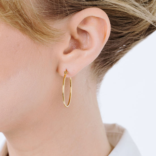 PENDIENTES DE ARO DE ACERO DE 25 MM DE DIÁMETRO PARA MUJER